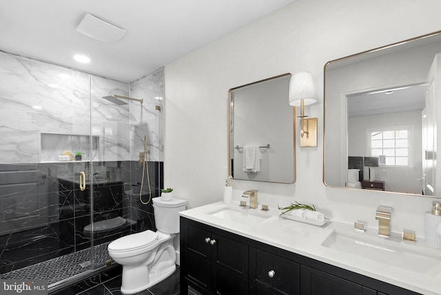 bathroom with walk in shower, a fireplace, vanity, and toilet