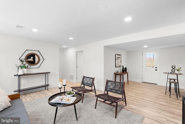 living area featuring light hardwood / wood-style flooring