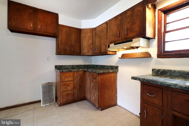 kitchen featuring light tile patterned flooring