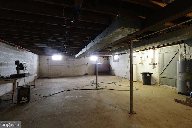 basement featuring electric water heater