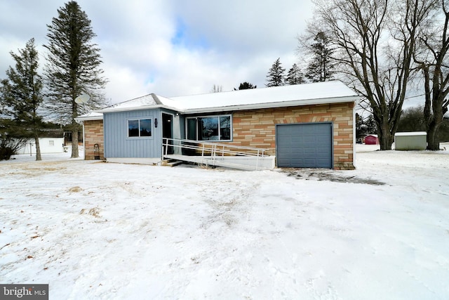 ranch-style home featuring a garage