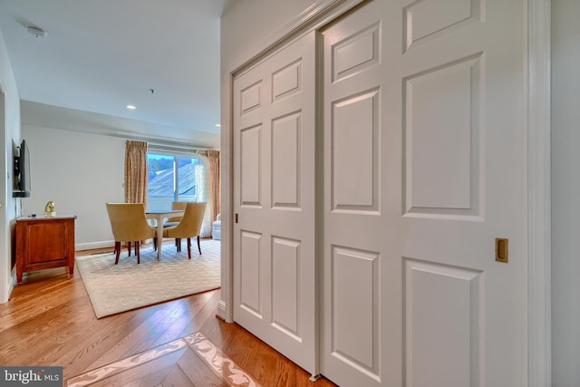 hallway with light wood-type flooring