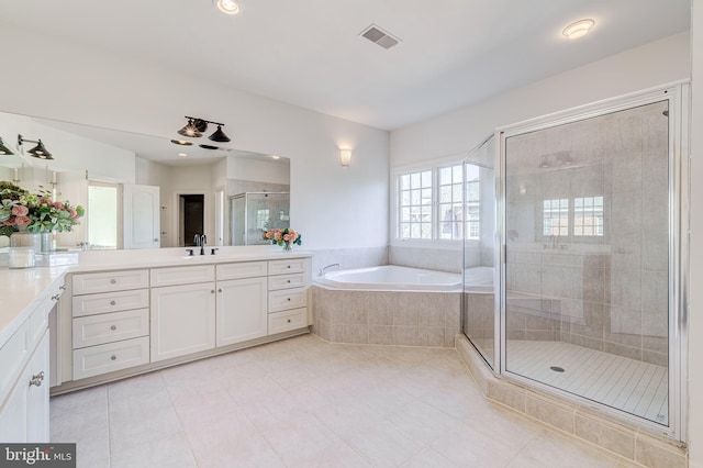 full bath featuring visible vents, tile patterned flooring, vanity, a shower stall, and a bath