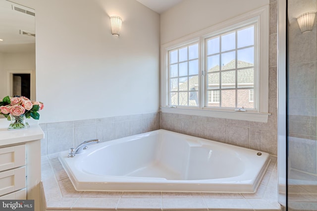 full bath featuring visible vents and a bath