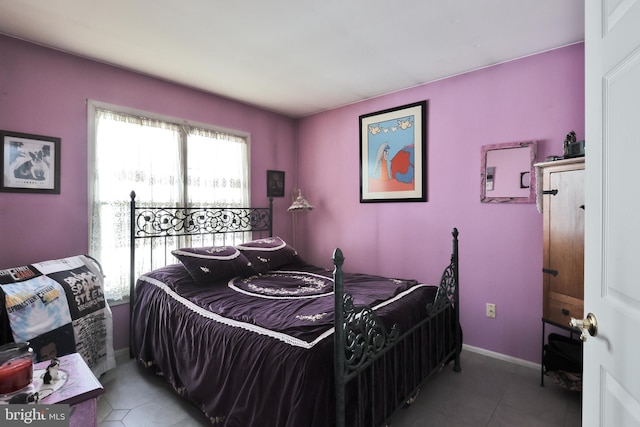 bedroom featuring tile patterned flooring