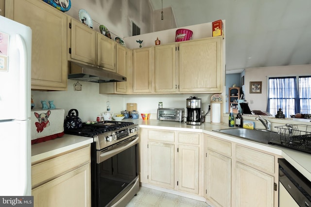 kitchen with sink, gas range, light brown cabinets, dishwashing machine, and white fridge