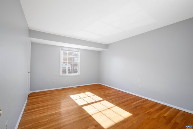 unfurnished room featuring light hardwood / wood-style flooring