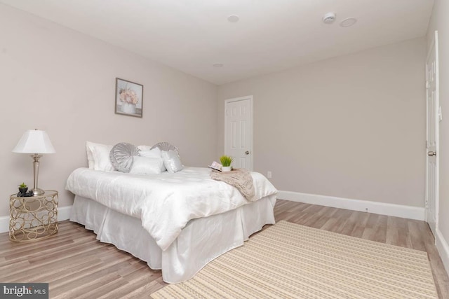 bedroom featuring light hardwood / wood-style flooring