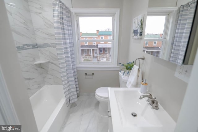 full bathroom with shower / tub combo, toilet, and sink