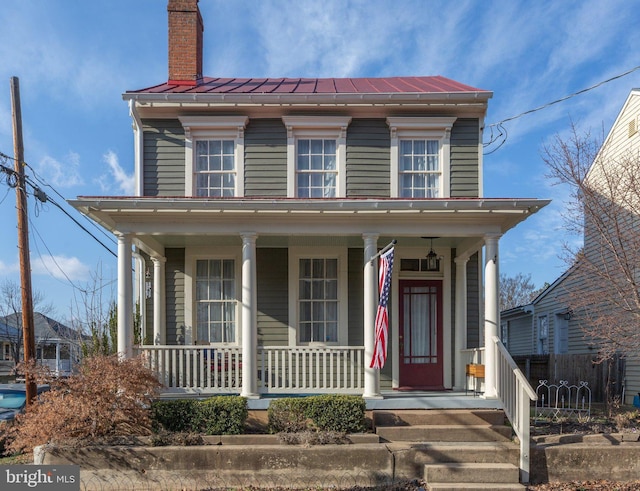 view of front of home featuring covered porch