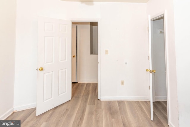 unfurnished bedroom featuring light hardwood / wood-style flooring