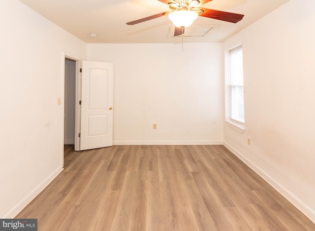 spare room featuring ceiling fan and light wood-type flooring