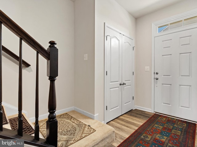 foyer with light wood-type flooring