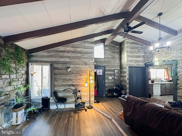 6073 Wycoff Sq, Centreville, VA 20120 - living room with wood-type flooring, high vaulted ceiling, a wood stove, and a healthy amount of sunlight