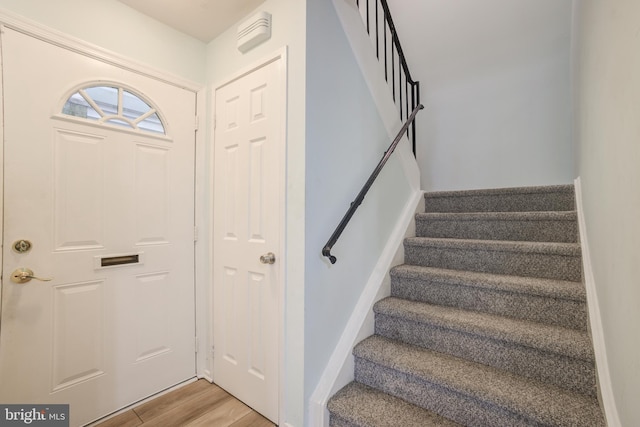 foyer with light hardwood / wood-style flooring