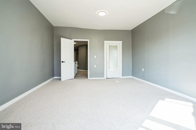 unfurnished bedroom with light carpet