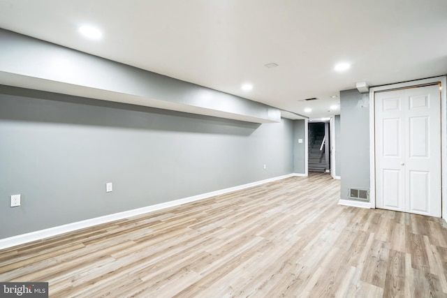 basement with light wood-type flooring