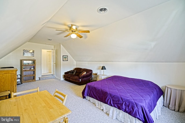 bedroom with lofted ceiling, carpet flooring, visible vents, and ceiling fan