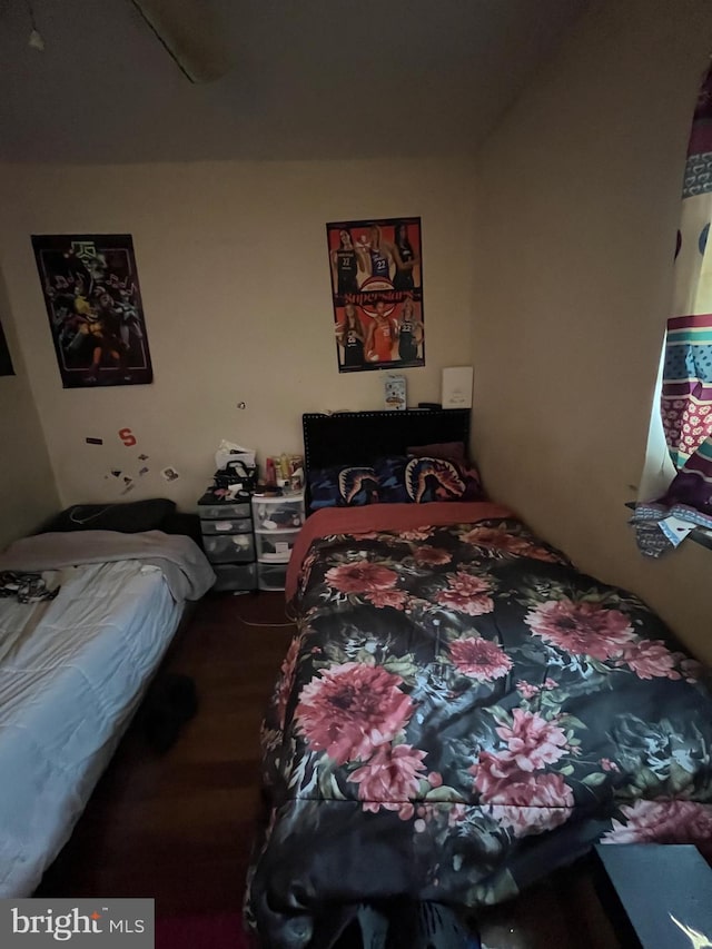 bedroom featuring wood-type flooring