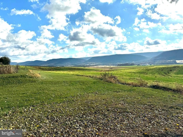 view of mountain feature featuring a rural view