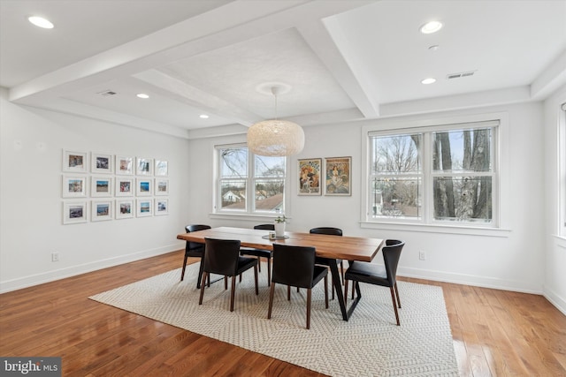 dining space featuring beam ceiling, recessed lighting, light wood-style flooring, and baseboards