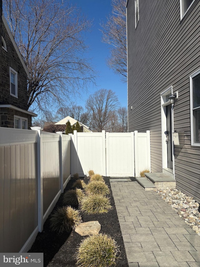 exterior space with a fenced backyard