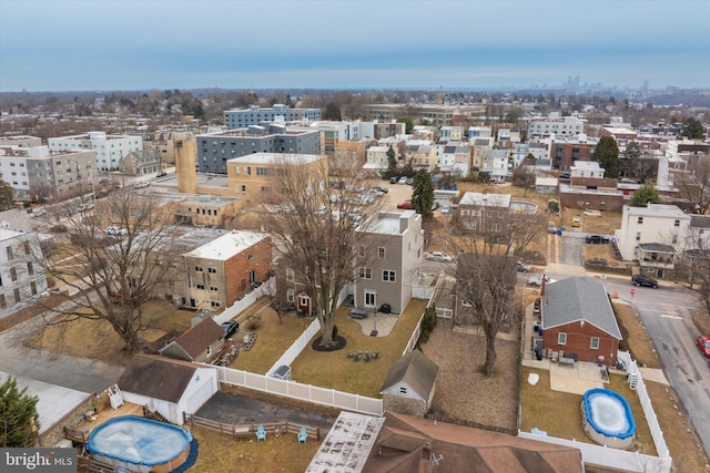 birds eye view of property featuring a view of city