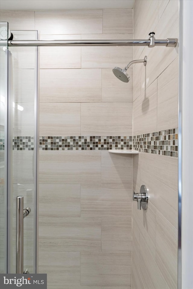 bathroom with a stall shower