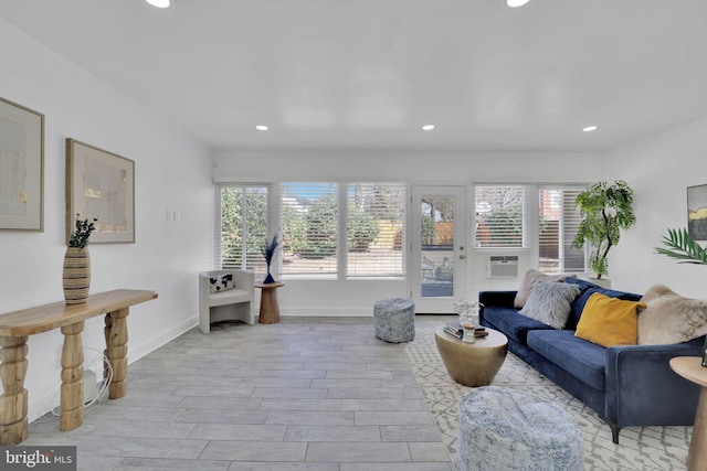 interior space featuring recessed lighting, baseboards, and wood finish floors