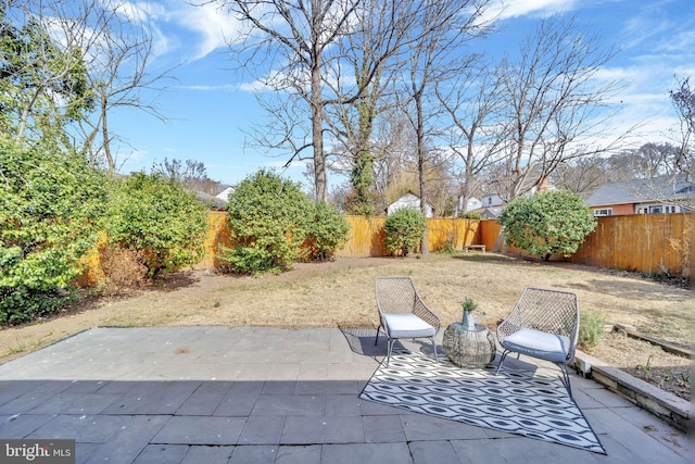 view of patio with a fenced backyard