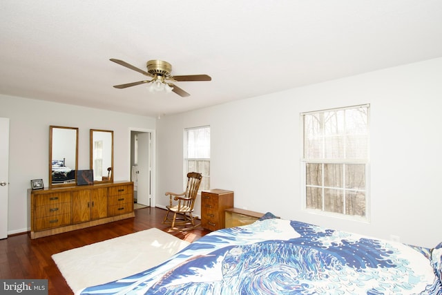 bedroom featuring ceiling fan and dark wood-type flooring