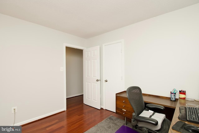 office area with dark hardwood / wood-style flooring