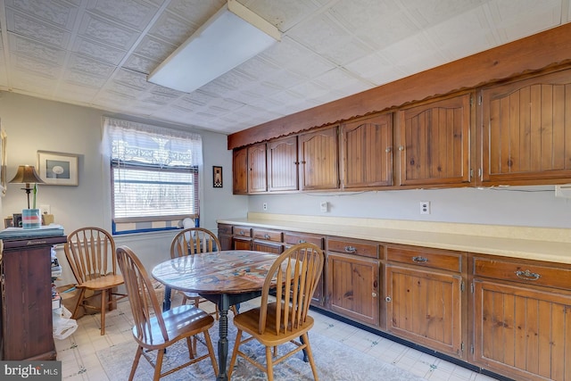 dining room featuring light floors