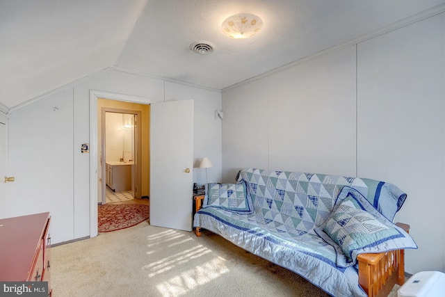 interior space featuring vaulted ceiling and visible vents