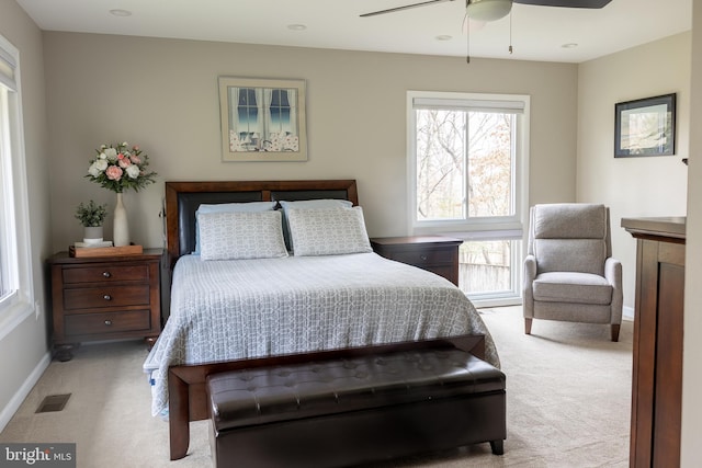 carpeted bedroom with ceiling fan