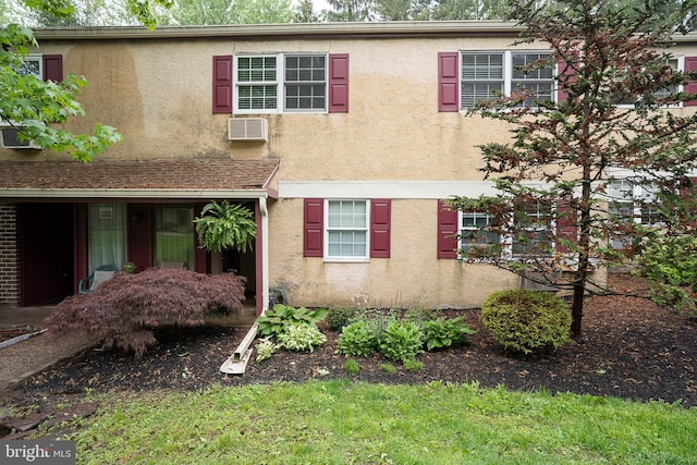 178 Elephant Rd Unit B21, Dublin, PA 18917 - view of front of home featuring stucco siding and a wall unit AC