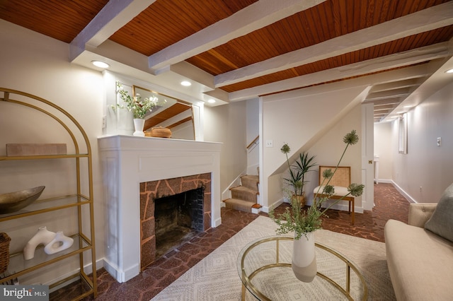 living room with recessed lighting, a fireplace, stairs, beam ceiling, and wood ceiling