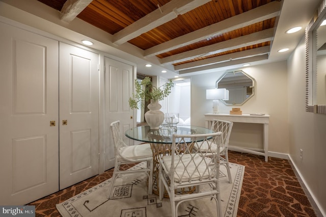 dining room featuring baseboards, recessed lighting, stone finish floor, beamed ceiling, and wood ceiling