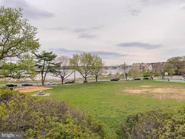 surrounding community with a lawn