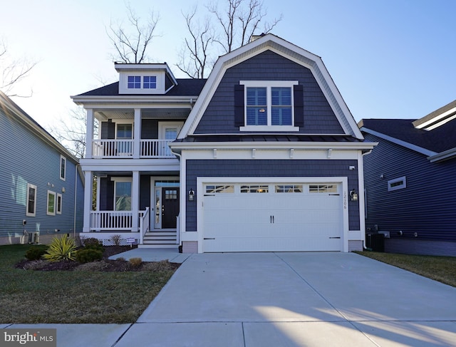 craftsman-style home with a garage, a balcony, central AC unit, and covered porch