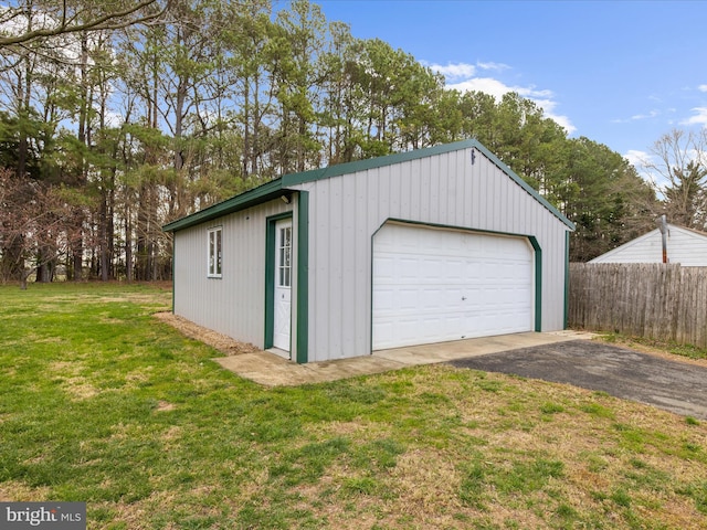 detached garage with fence