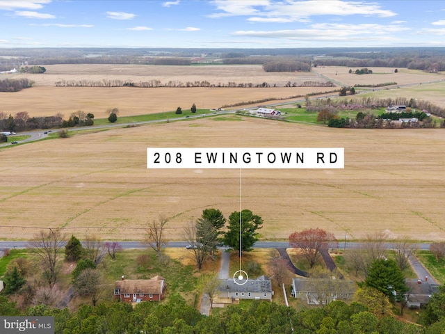 birds eye view of property featuring a rural view