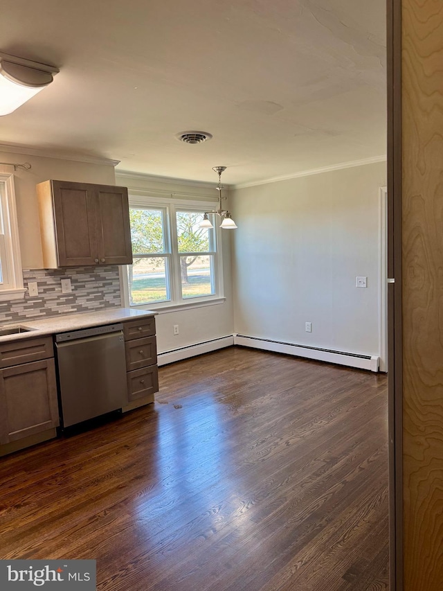 kitchen featuring crown molding, tasteful backsplash, stainless steel dishwasher, dark wood-style floors, and visible vents