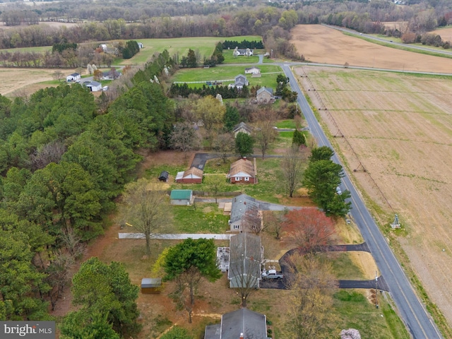 birds eye view of property featuring a rural view