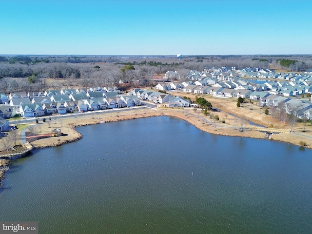 aerial view featuring a residential view and a water view