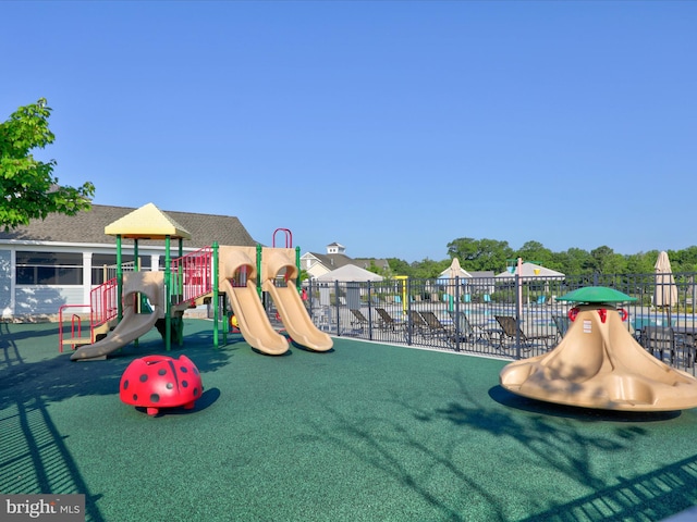 community jungle gym with fence