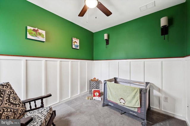 carpeted bedroom featuring ceiling fan