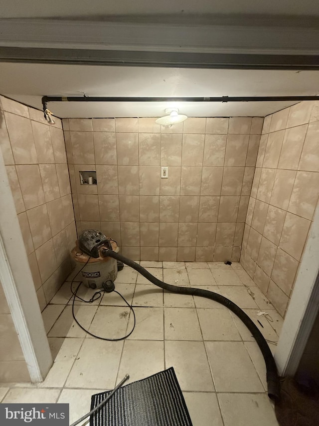 bathroom with tile patterned floors