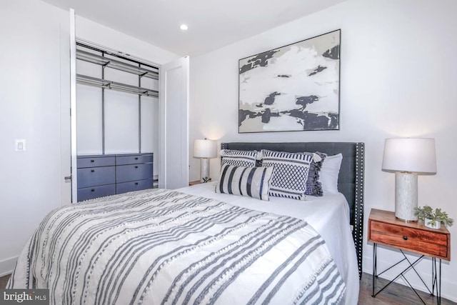 bedroom featuring hardwood / wood-style floors