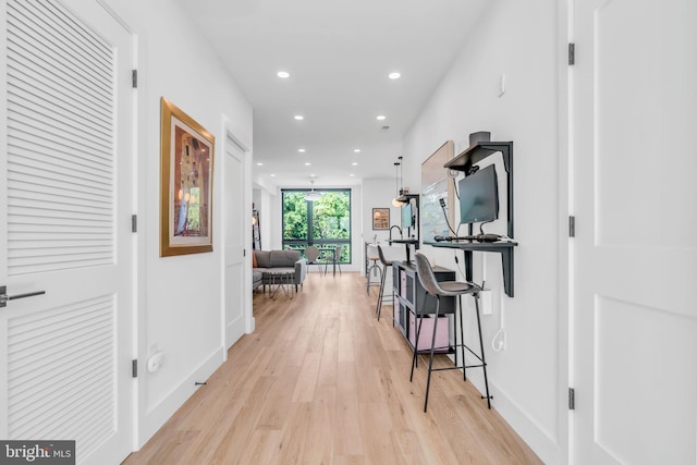 hall featuring light wood-type flooring